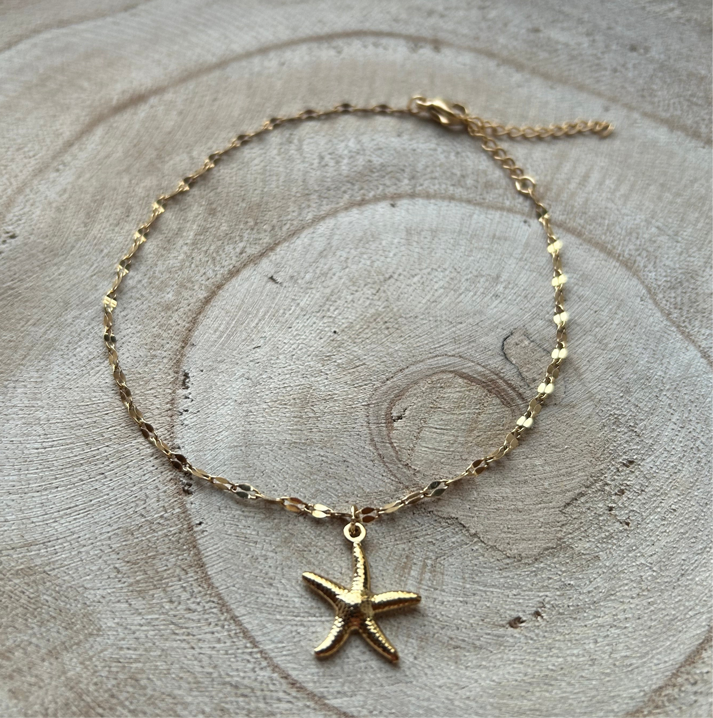 Enkelband zeester goud